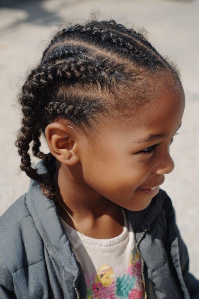 girl with lemonade braids hairstyle, side-swept cornrows