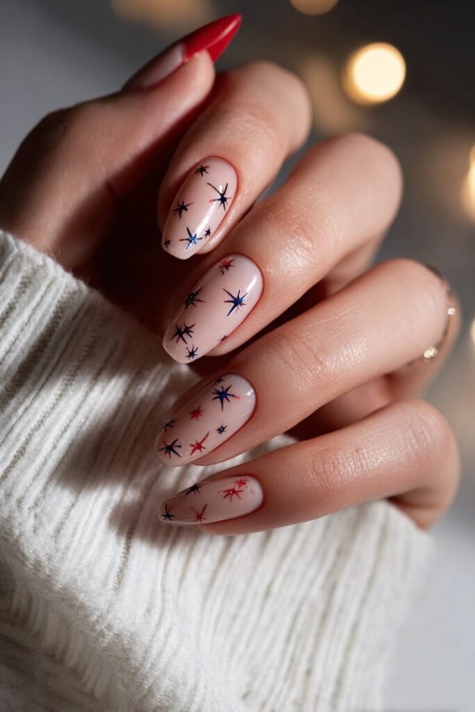 Patriotic nails with negative space star cutout designs.