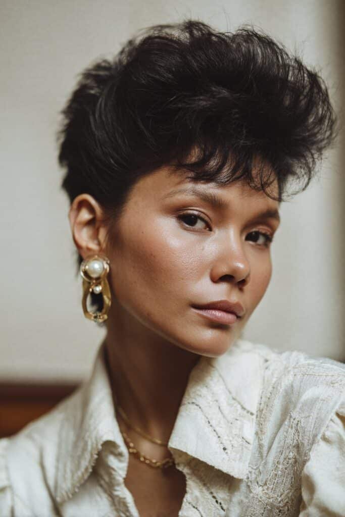 woman with teased bouffant 80s hairstyle