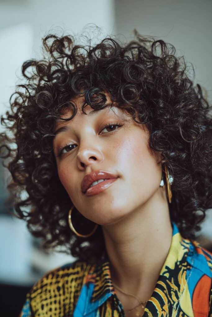 woman with spiral perm curly hairstyle
