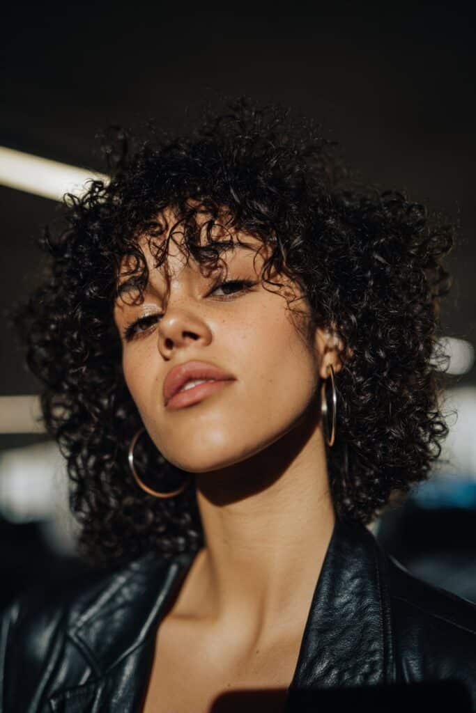 woman with wet look curls hairstyle