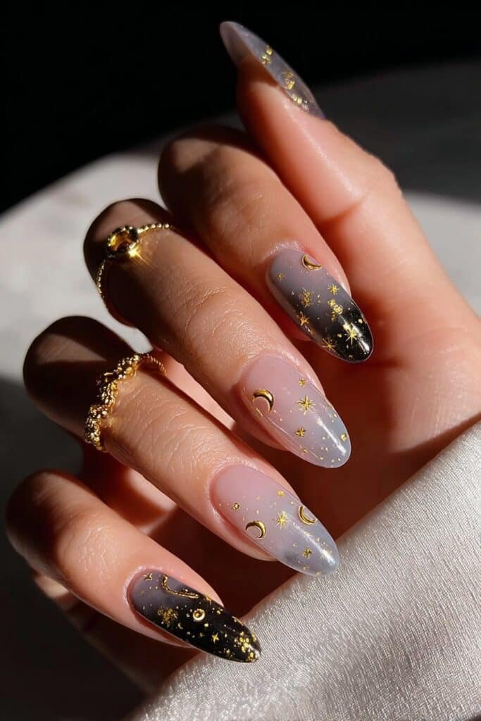 Celestial nails with stars, moons, and cosmic accents.