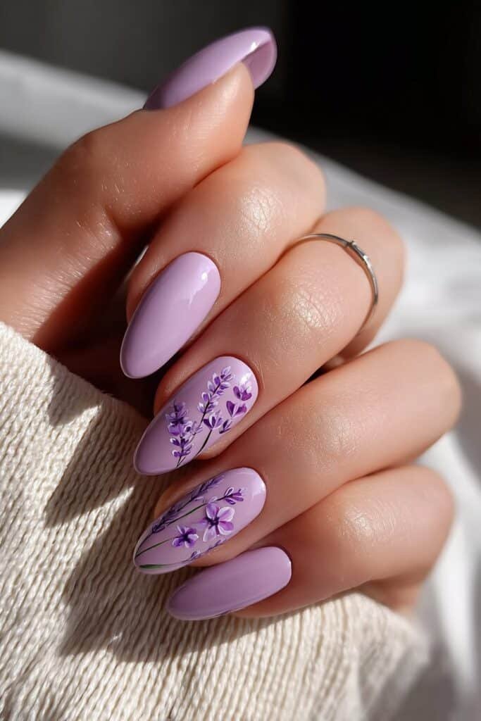 Lavender flower nails with soft purple botanical details.