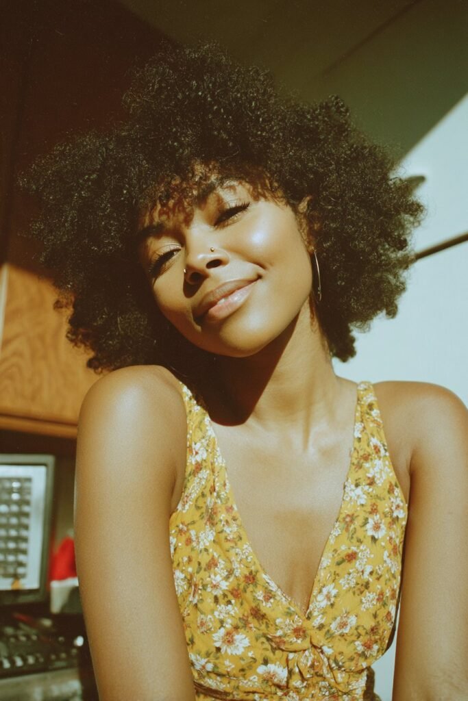 Black woman with a vintage afro puff