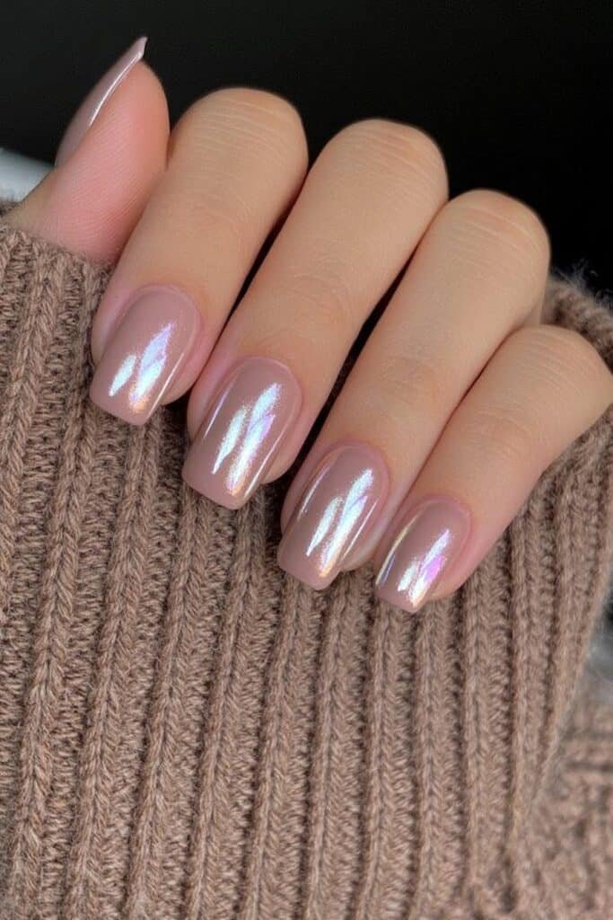 Short antique bronze metallic nails with reflective shine.
