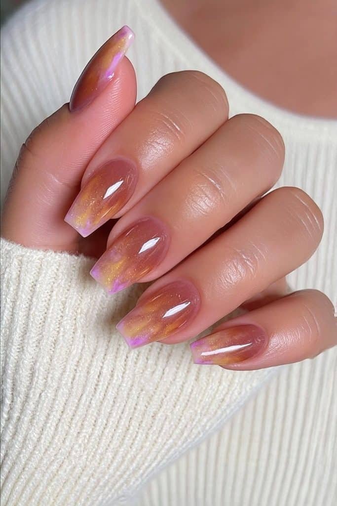 Short squoval Thanksgiving nails with a glossy burnt-orange to caramel nude ombré.