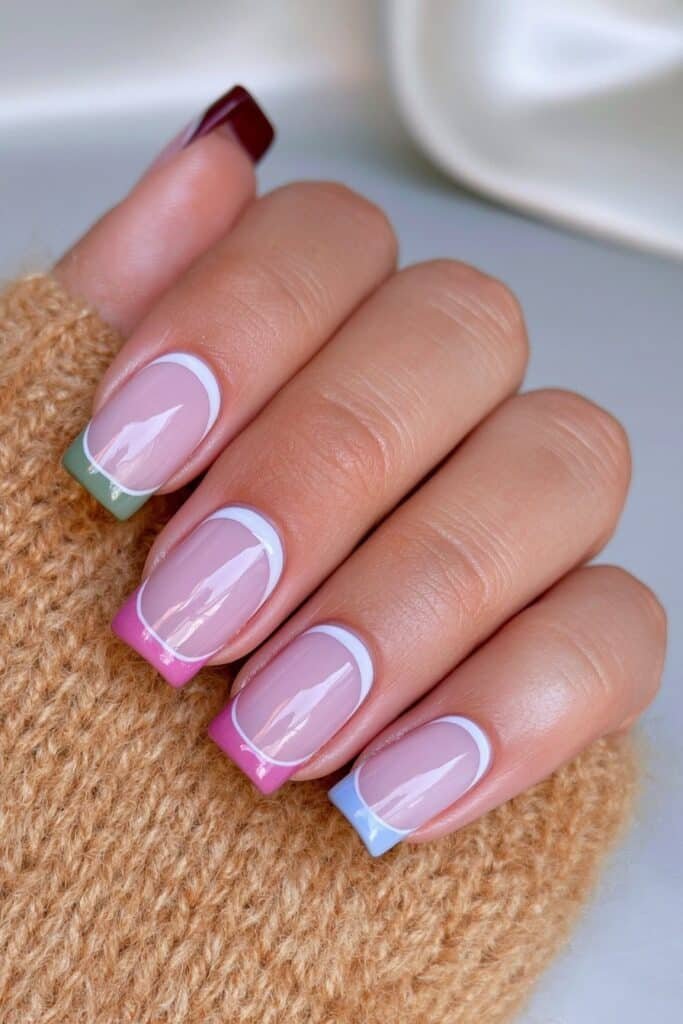 Short color-block French nails in earthy fall shades.