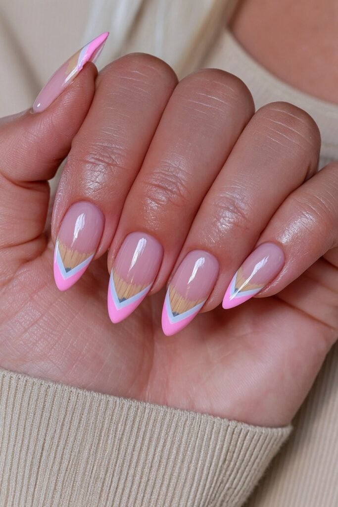 Classic pencil-inspired French tip nails with pink eraser details.