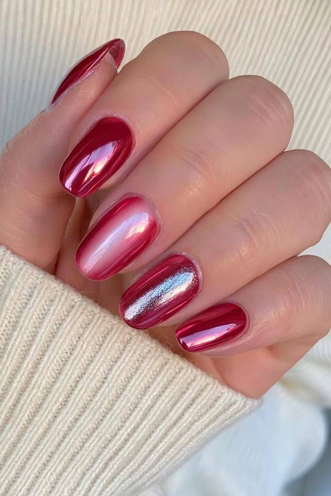 Short squoval nails in rich red velvet magnetic polish with dimensional shimmer.