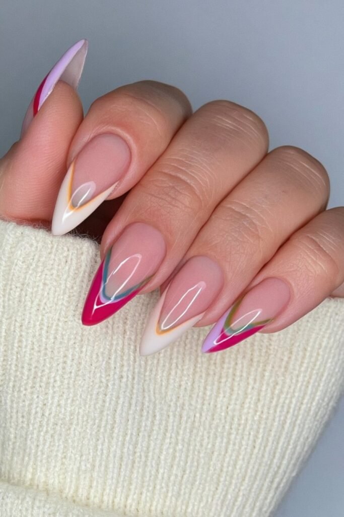 Almond nails with white, caramel, cream, and olive color blocks.