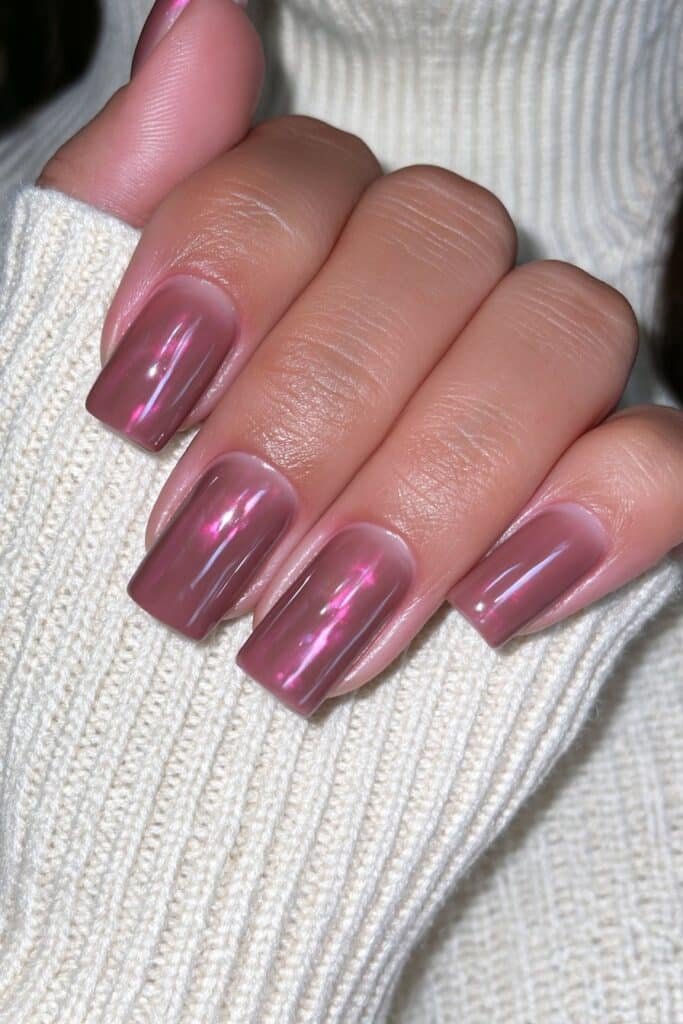 Short chocolate brown nails with a glossy cozy autumn finish.