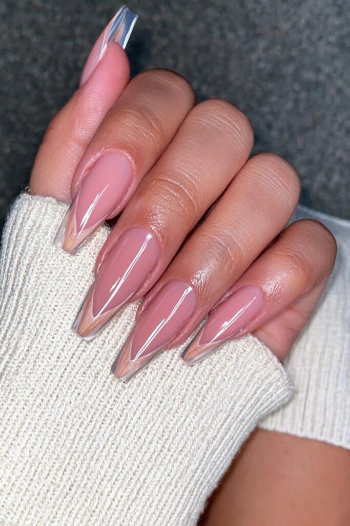 Begie nails with dust rose pencil-inspired French tips.
