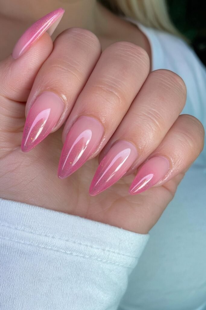 Pink eraser-inspired nails with yellow pencil and graphite accents.