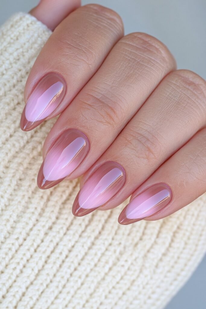 Short espresso brown ombré nails fading into nude.
