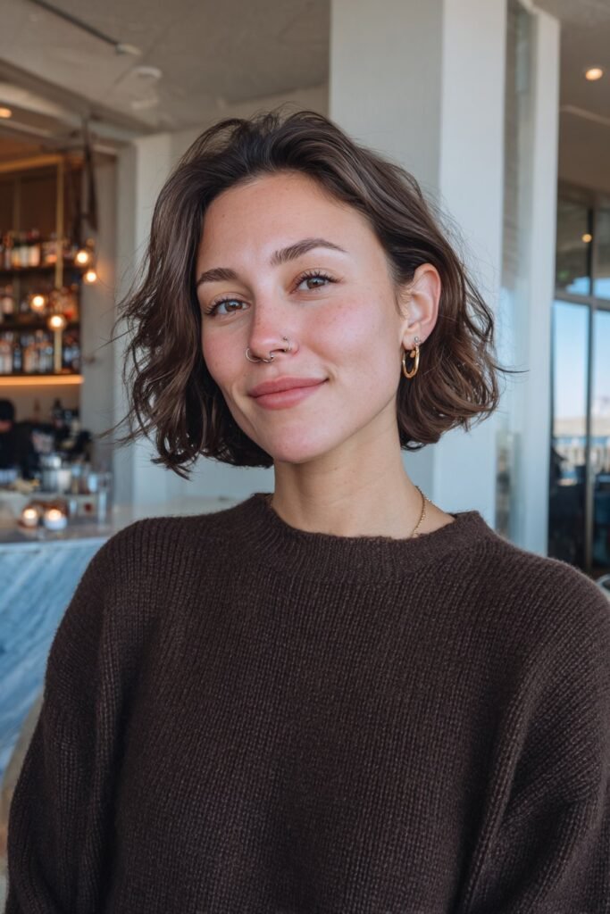 Espresso martini brown hair with cool mocha reflections and glossy silky layers.