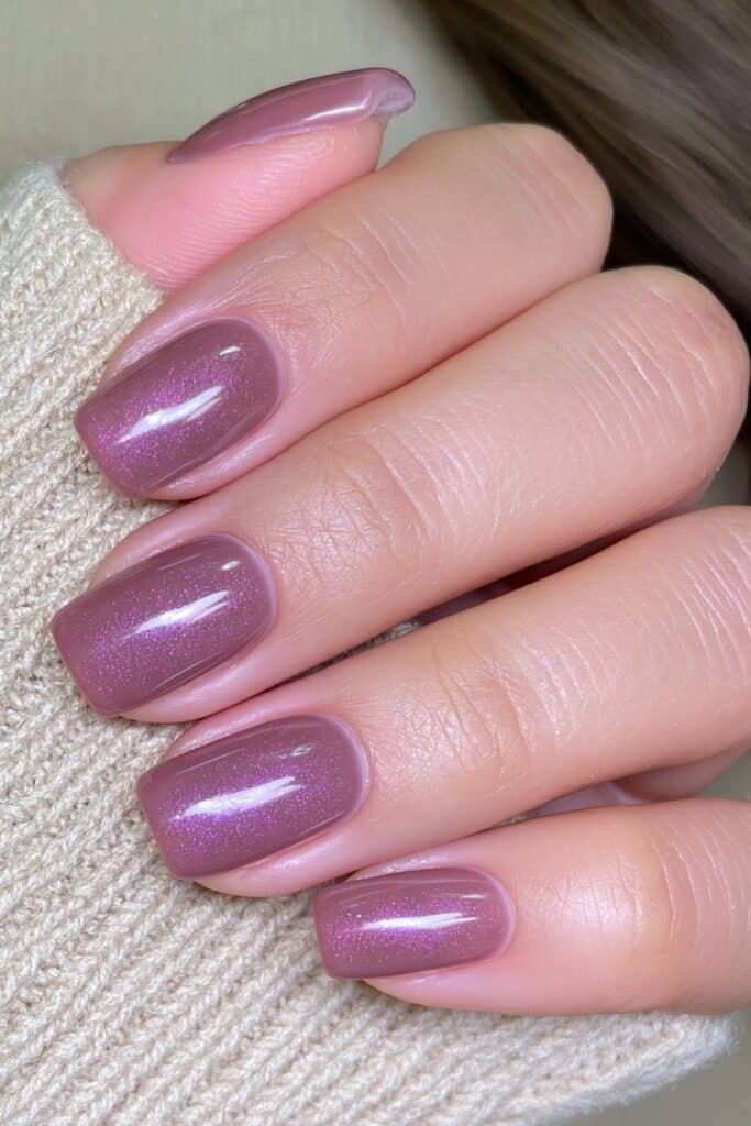 Short squoval espresso brown autumn nails with an elegant soft-matte finish.