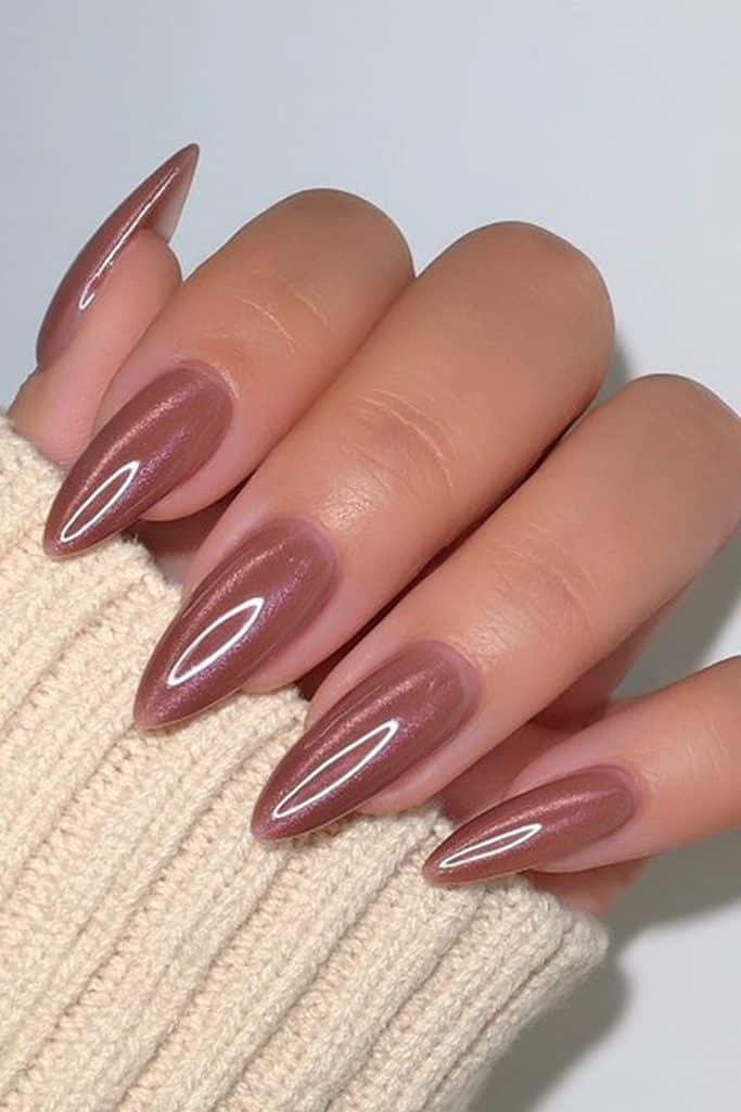 Short almond nails with chocolate brown glazed donut chrome finish