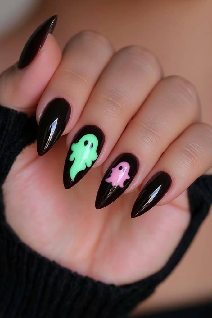 Short charcoal almond nails with one luminous ghost accent.