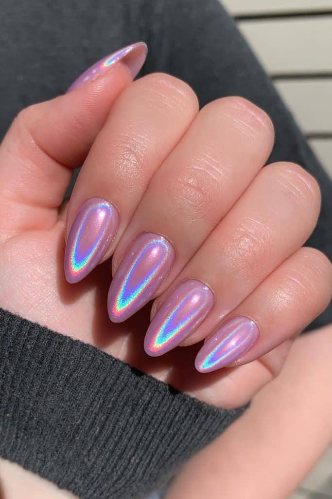 Short translucent purple nails with iridescent shiny foil.