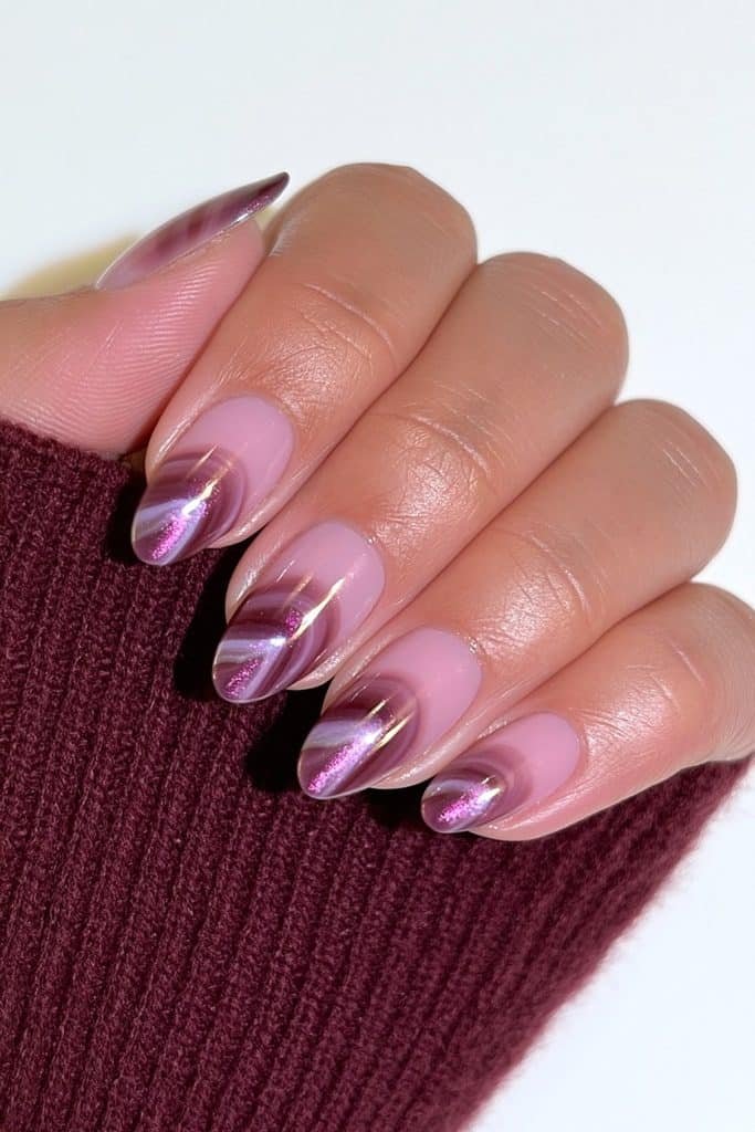 Short almond nails with luxurious merlot, black, and smoky plum marble swirls.