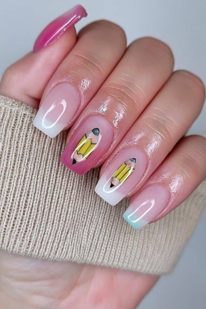Nude nails with miniature yellow pencil accent designs.