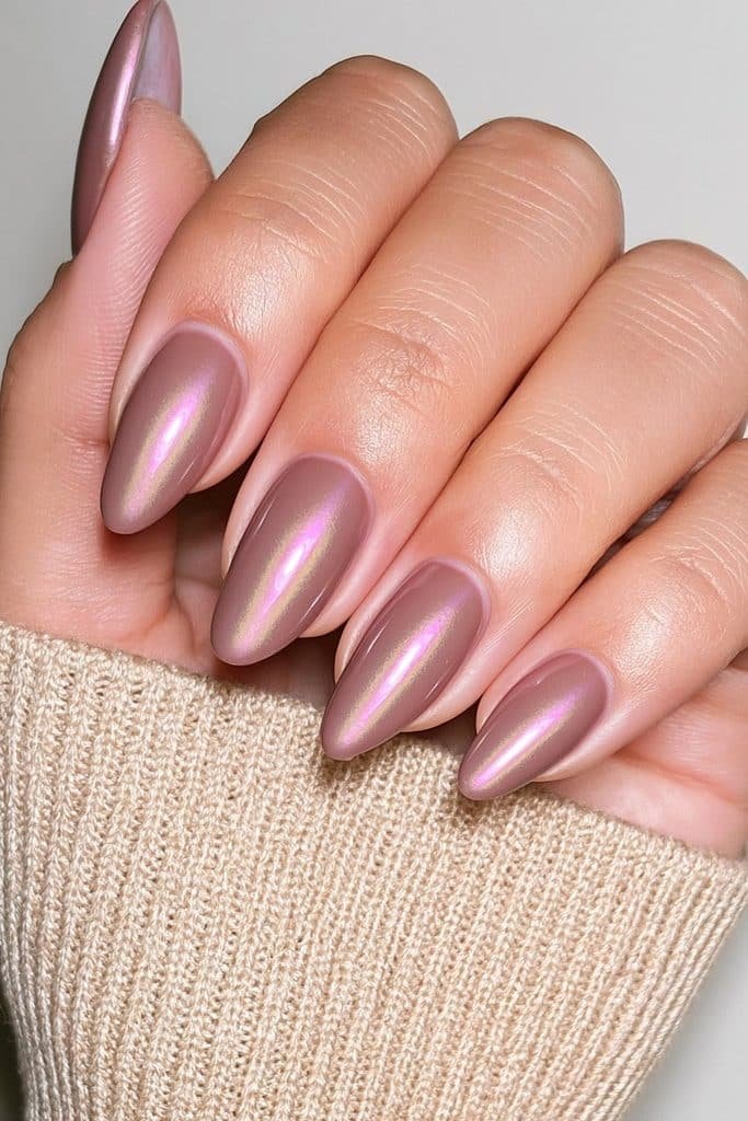 Short round nails in creamy mocha brown with a translucent pearlescent glazed finish.