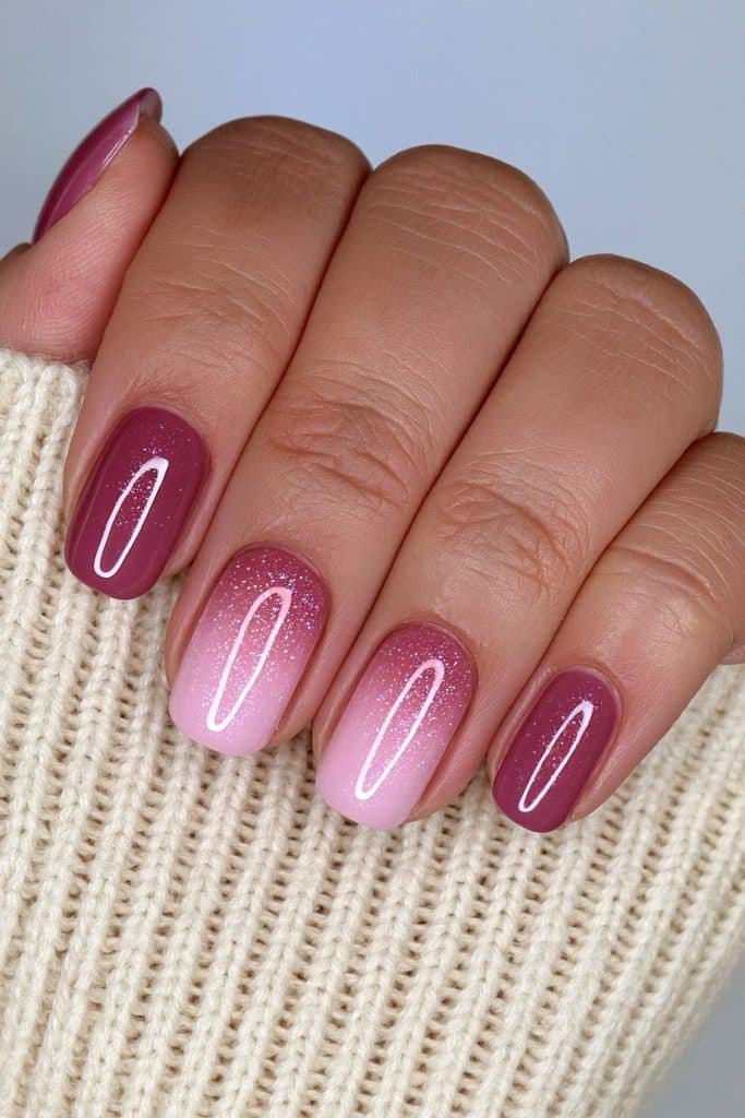 Short red velvet nails with one glowing red aura accent and magnetic shimmer.