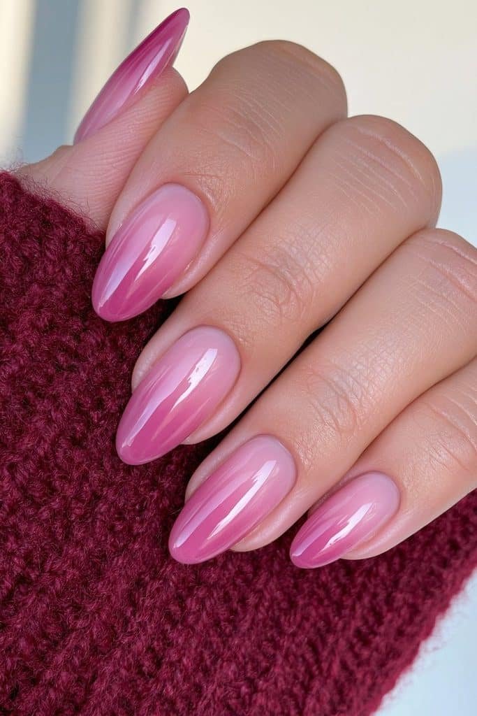 Short almond Thanksgiving nails in rose quartz manicure with glossy shine.