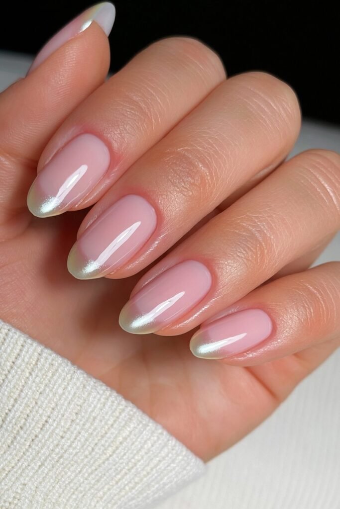 Short nude nails with soft chrome French tips.