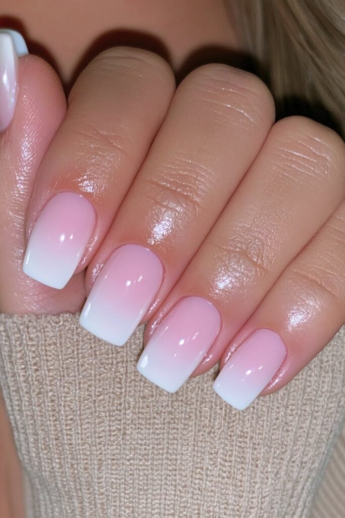 Short creamy ivory squoval nails with glossy shine.