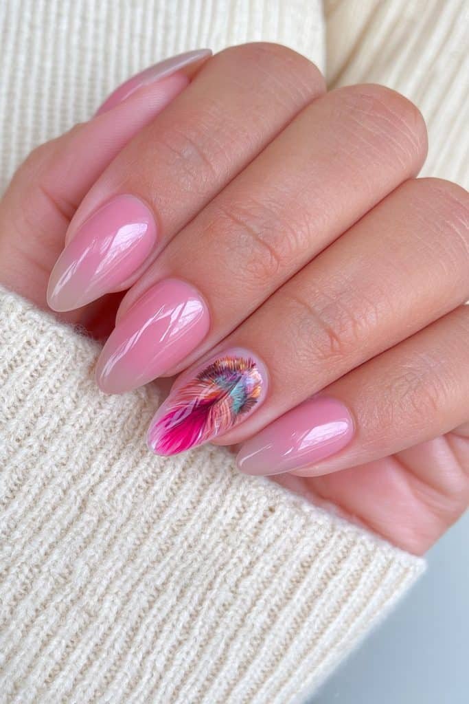 Short almond Thanksgiving nails with warm nude tones and a detailed autumn turkey feather accent.