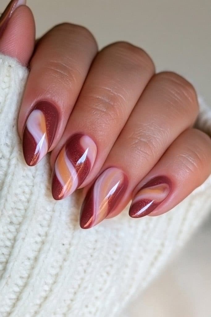 Chocolate brown nails with creamy caramel swirls