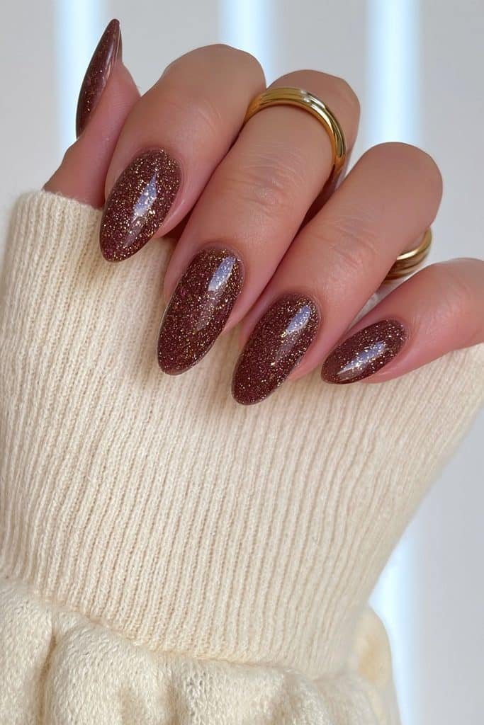 Glossy chocolate nails with fine champagne glitter