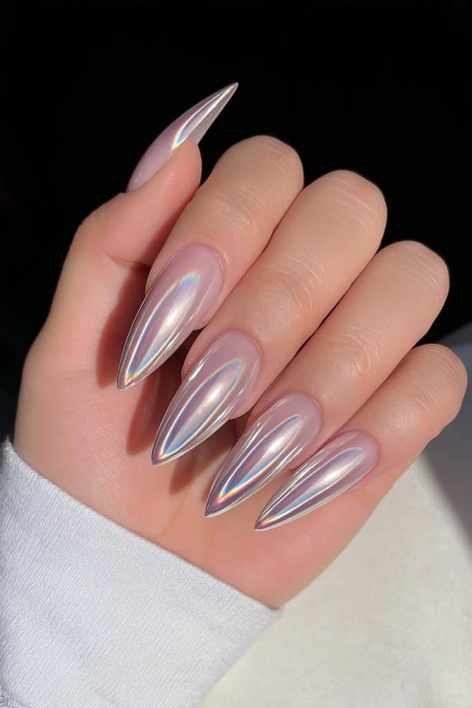 Mirror chrome silver stiletto nails with reflective finish