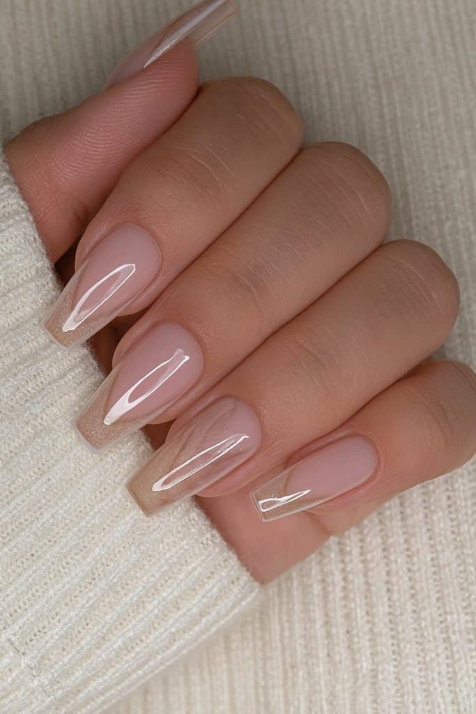 Classic nude coffin nails with a refined glossy finish