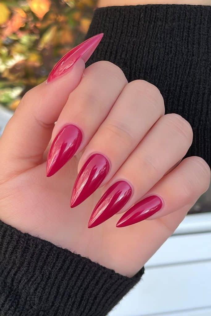 Classic cherry red stiletto nails with glossy shine