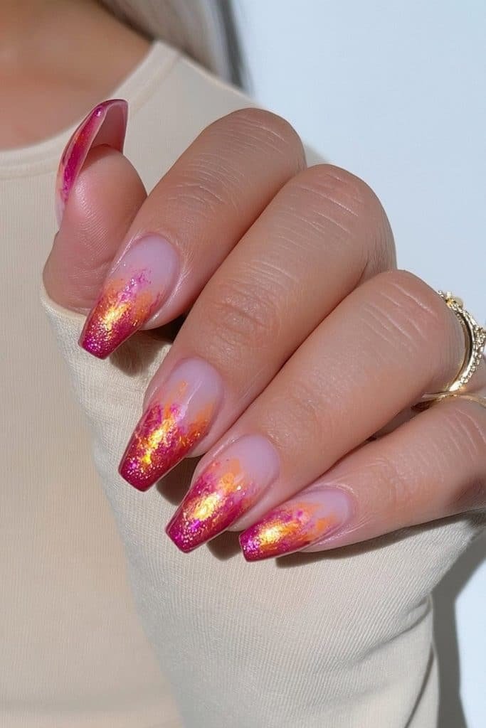 Coral ombré coffin nails fading into peachy nude