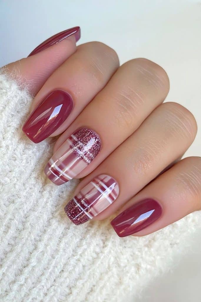 Cranberry nails with cozy plaid accent designs