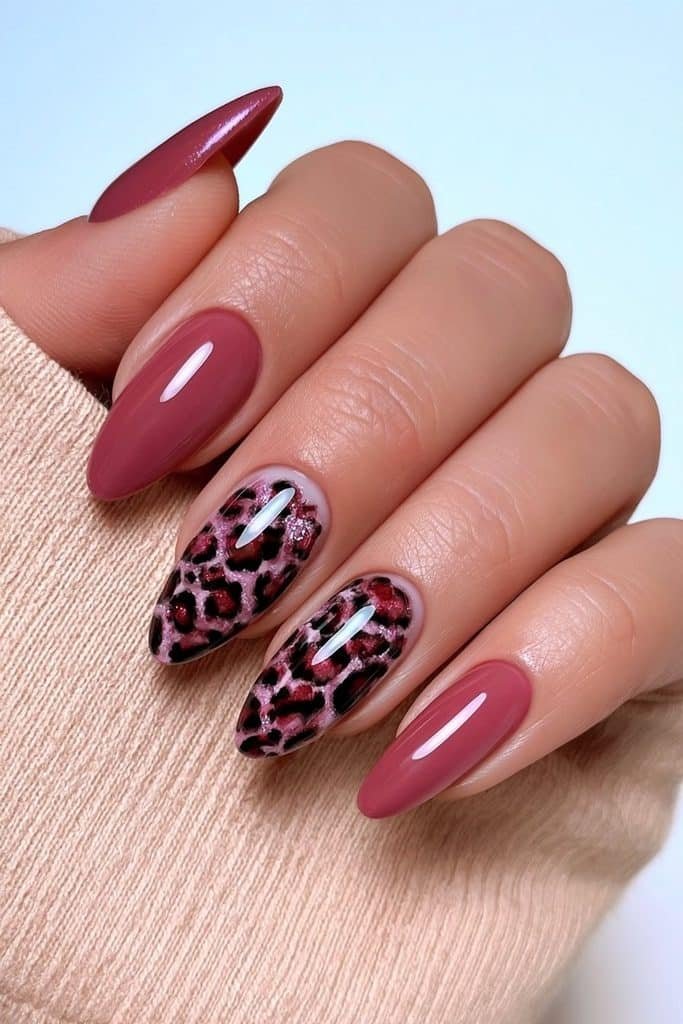 Cranberry nails with chic animal print accents