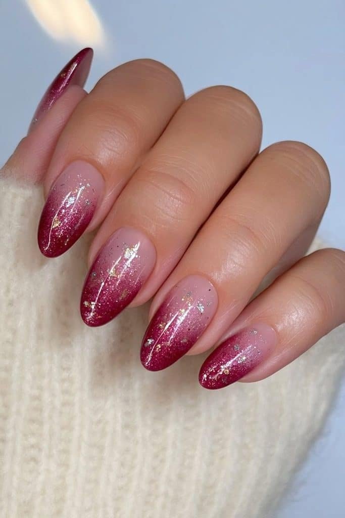 Cranberry nails with festive silver and champagne sparkle