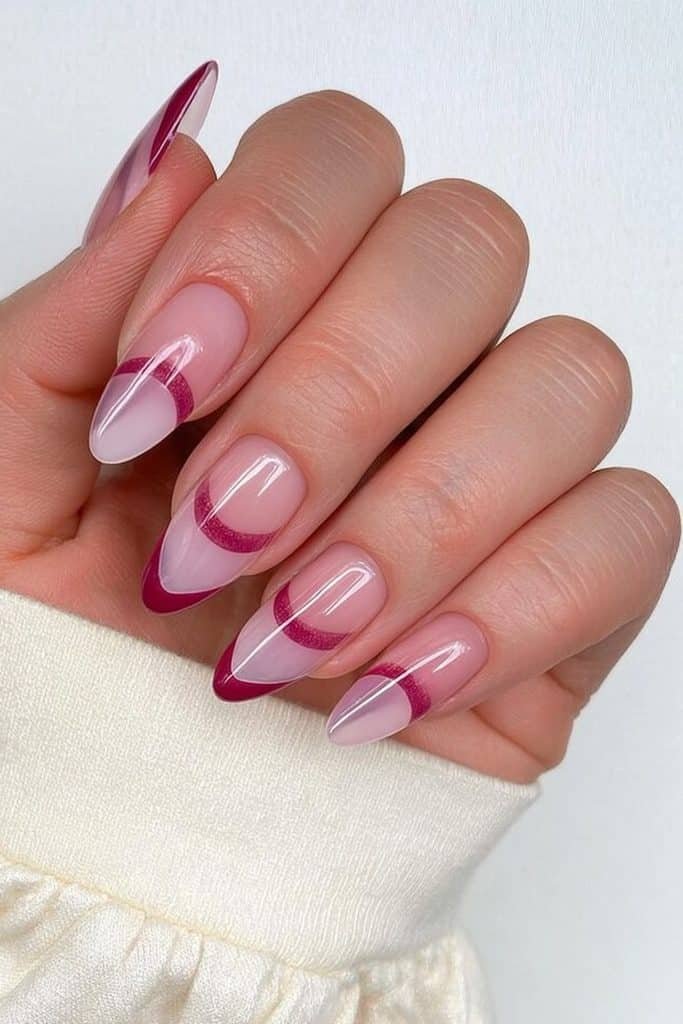 Nude nails with cranberry negative-space details