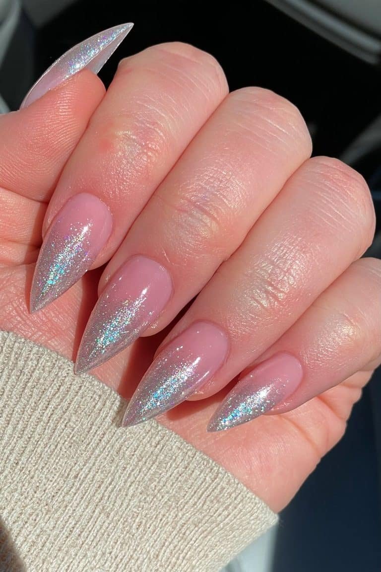 Nude-pink stiletto nails with fine champagne glitter