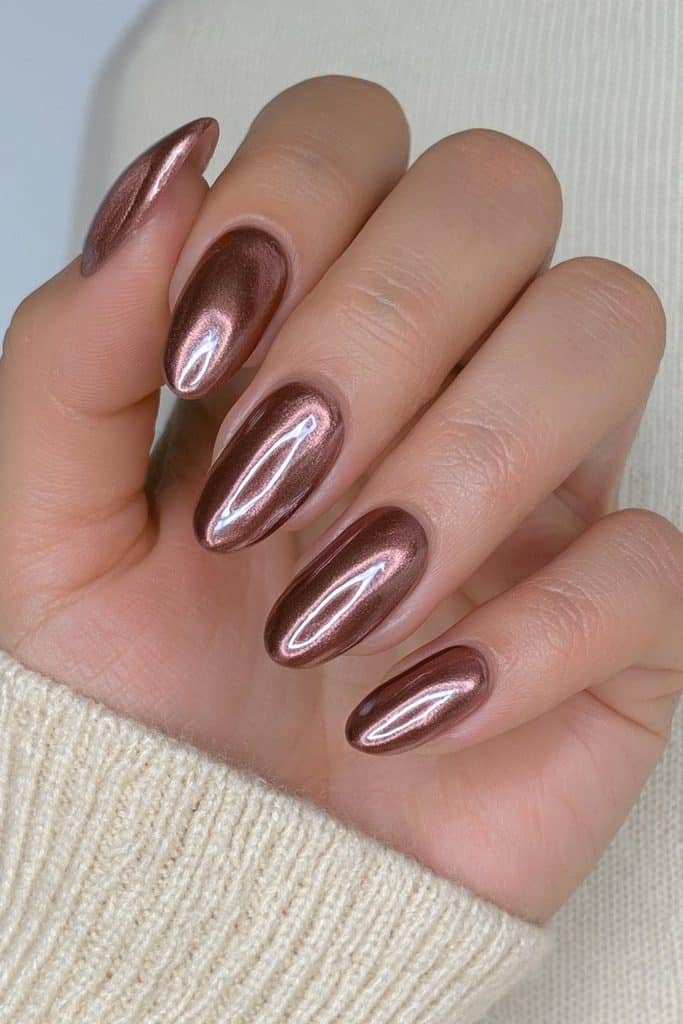 Glazed chocolate brown chrome almond nails