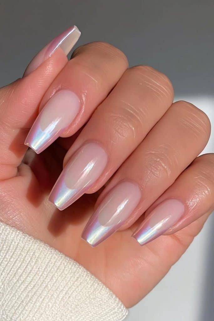 Milky nude coffin nails with glazed chrome French tips
