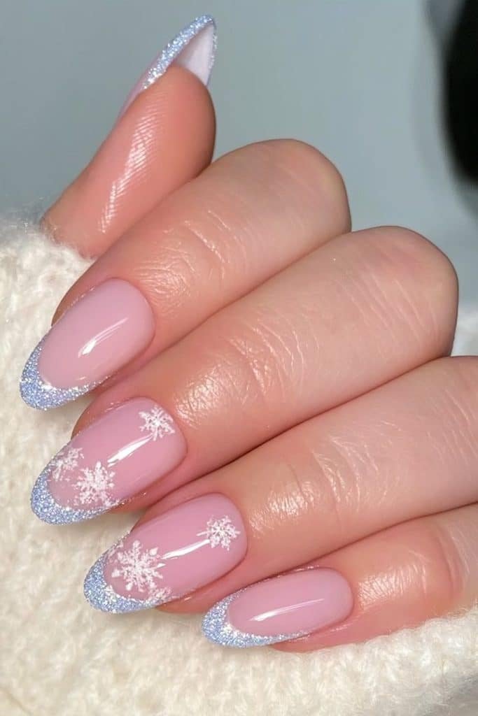 Silver glitter French tips with delicate snowflake accents