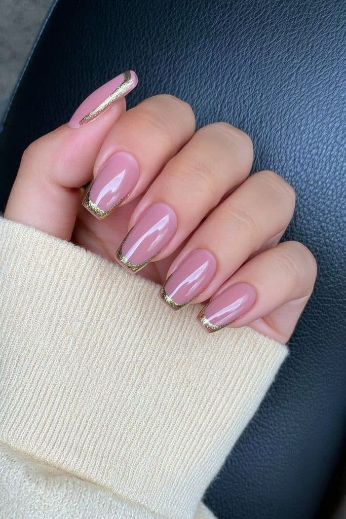 Nude beige coffin nails with delicate gold trim