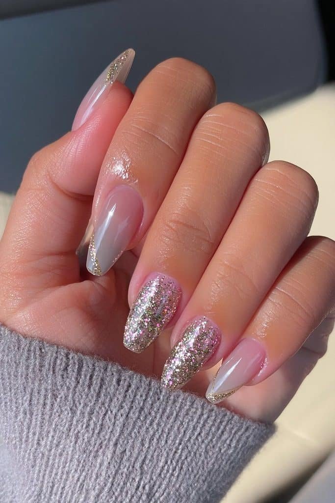 Cool gray nails with elegant gold glitter accents