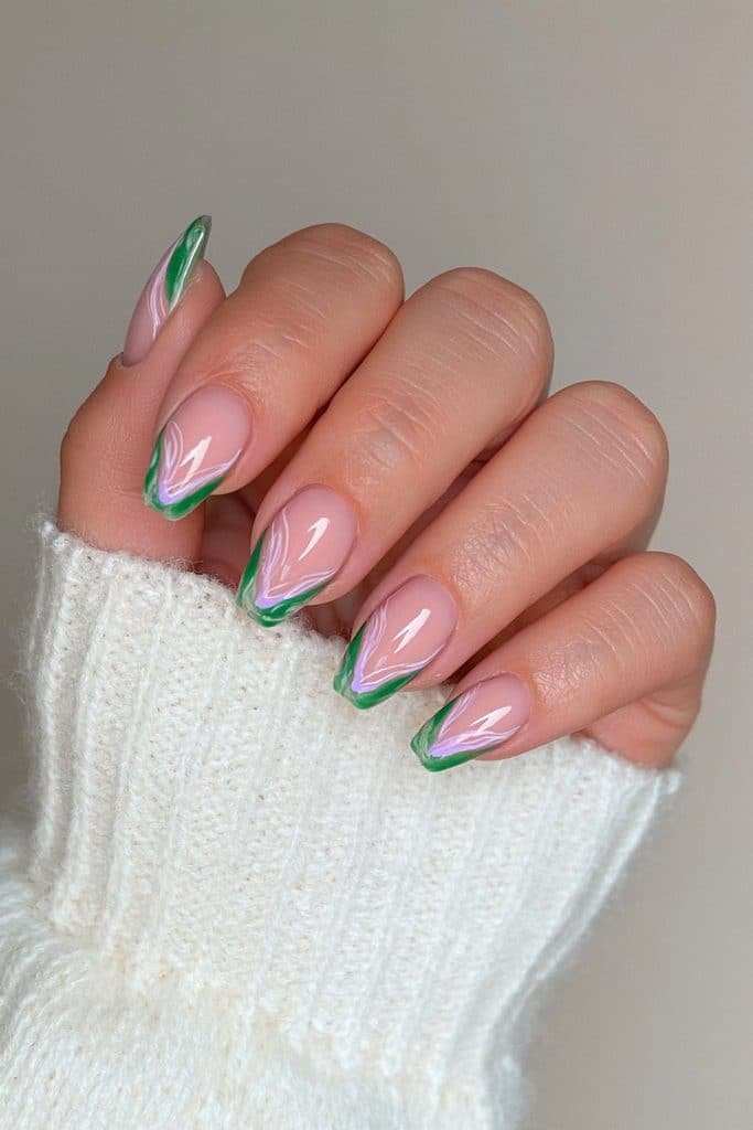 Deep green French tips with delicate white swirls