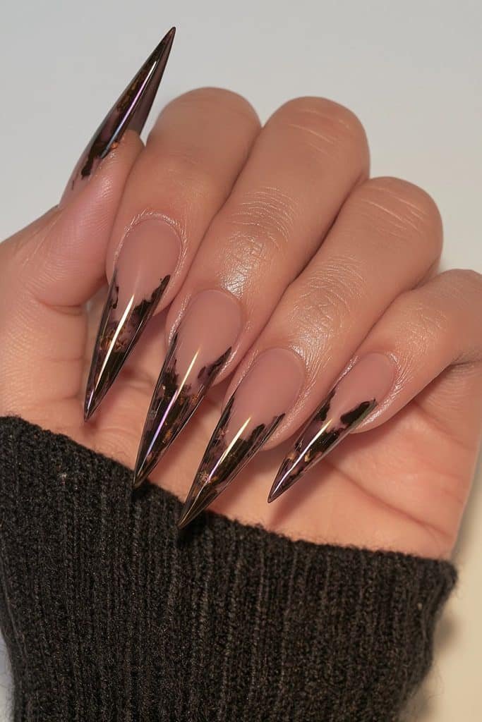 Extra-long glossy brown stiletto nails with dramatic points
