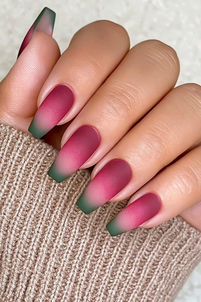 Matte cherry red and forest green almond nails